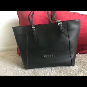 Guess tote. Black. Med size. Never used.